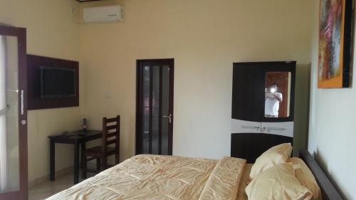 Ένα ή περισσότερα κρεβάτια σε δωμάτιο στο DSTAY Kost Bali