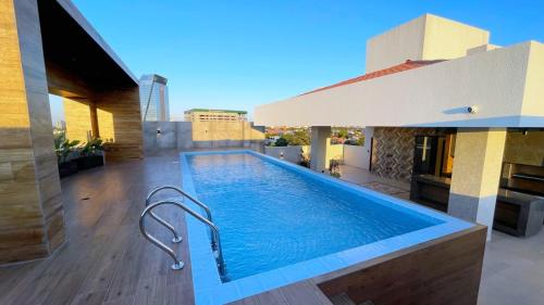 Bazén v ubytování Elegante Apartament/Mall Brisas nebo v jeho okolí