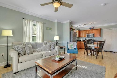 a living room with a couch and a table at 2 Bed Condo Walk to the Beach in Tybee Island