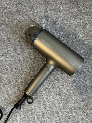 a hair dryer sitting on top of the floor at Bonnie & Clyde's hideout in Rīga