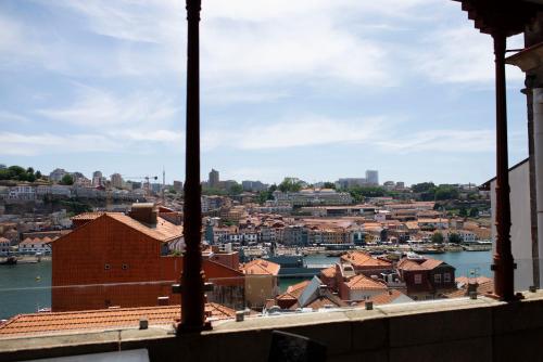 a view of a city from a building at Hotel Carris Porto Ribeira in Porto