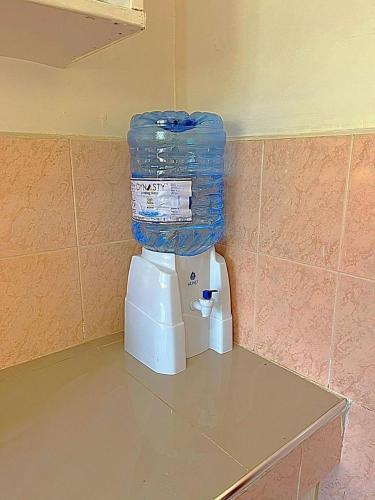 a pile of plastic bags on top of a blender at Homely apt 3 (three) in Kisumu
