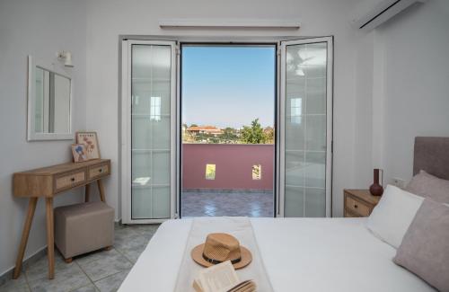 Кровать или кровати в номере Villa Spiros II Apartments & Studios 50m From Center 300m From Laganas Beach Ideal For Families And Groups