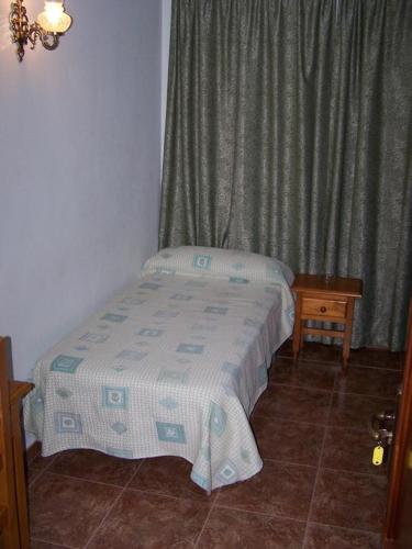 Katil atau katil-katil dalam bilik di Hostal Adrian
