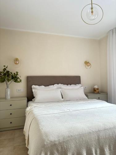 Ένα ή περισσότερα κρεβάτια σε δωμάτιο στο Tiny Apartment Mallorca