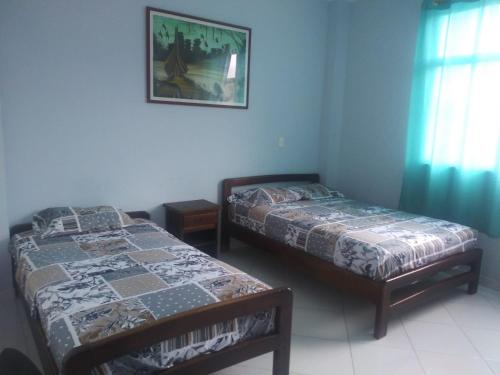 Postel nebo postele na pokoji v ubytování Hotel Salduba