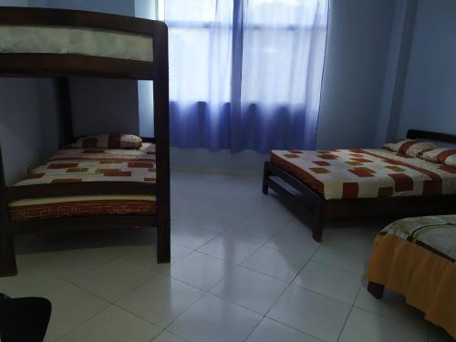 Postel nebo postele na pokoji v ubytování Hotel Salduba