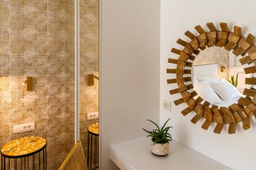 a bathroom with a mirror and a shower at PARGA Villas Collection in Parga