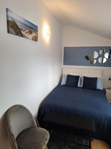 Posteľ alebo postele v izbe v ubytovaní Apartment Dorina