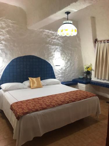 Ένα ή περισσότερα κρεβάτια σε δωμάτιο στο Suit Junior Emano 410
