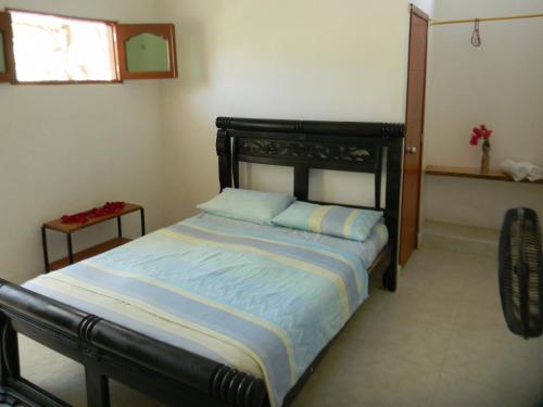 Una cama o camas en una habitación de HostalNativo