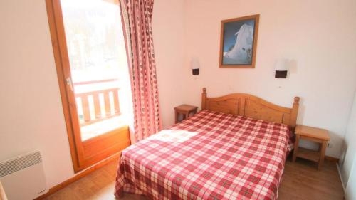 Postel nebo postele na pokoji v ubytování Résidence Parc Aux Etoiles - CH12PAE - CHALET DUPLEX 2 CHAMBRES, BORD DE PISTE MAE-2244