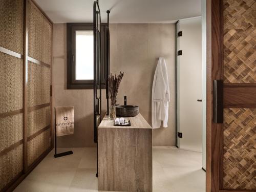 Ванная комната в Anemelia Hotel Mykonos