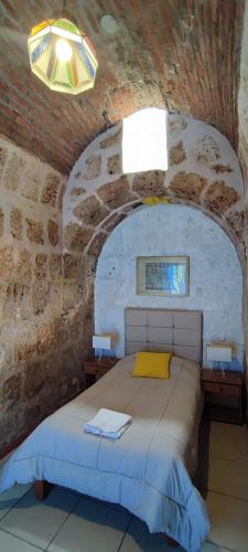 Ένα ή περισσότερα κρεβάτια σε δωμάτιο στο Flying Dog Hostel Arequipa