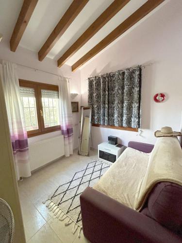 a bedroom with a bed and a mirror in it at Sweet Home in Pego