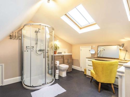 a bathroom with a shower and a desk and a sink at 2 bed property in Horncastle 86663 in Horncastle