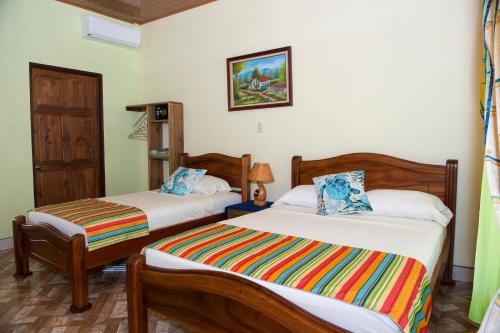 Hotel Sunshine Caribeにあるベッド