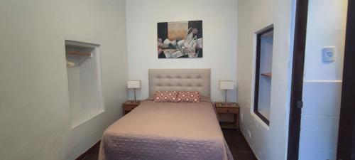 Ένα ή περισσότερα κρεβάτια σε δωμάτιο στο Flying Dog Hostel Arequipa
