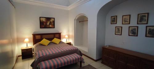 Ένα ή περισσότερα κρεβάτια σε δωμάτιο στο Flying Dog Hostel Arequipa