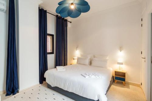 Giường trong phòng chung tại Riad 2 chambres & Petit Déjeuner -Terrasse