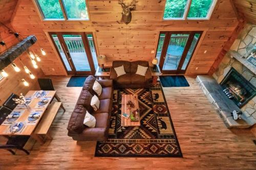 an overhead view of a living room in a log cabin at NEW HOT TUB! Secluded 3 Bed Cabin in Pigeon Forge in Pigeon Forge