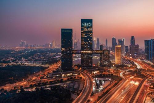 a city skyline at night with traffic at One&Only One Za'abeel in Dubai