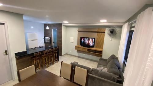 TV a/nebo společenská místnost v ubytování Triplex novo em Matinhos litoral Paraná