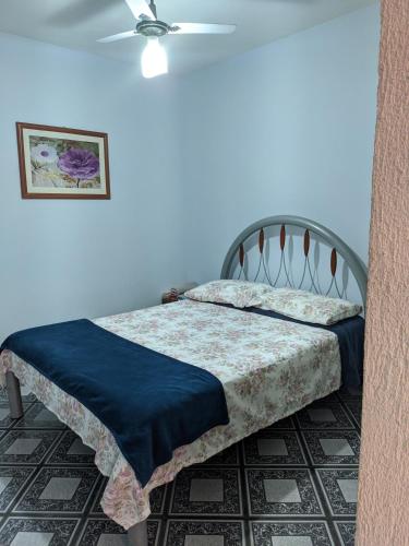 Llit o llits en una habitació de Cabo frio - casa para temporada