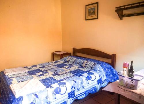 Ένα ή περισσότερα κρεβάτια σε δωμάτιο στο Hostal Juanita