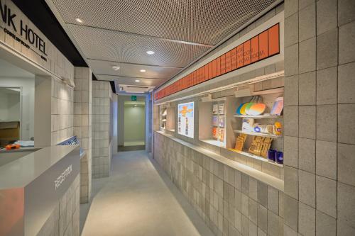 a hallway of a store with a food pantry at Aank Hotel Seoul Sinchon in Seoul