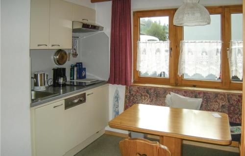 A kitchen or kitchenette at Ferienwohnung Mit Ausblick