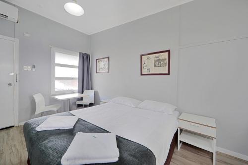 Ένα ή περισσότερα κρεβάτια σε δωμάτιο στο Ned Kelly's Motel