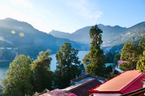 a view of the lake from a resort at Sukoon Lake view BnB by Boho Stays in Nainital