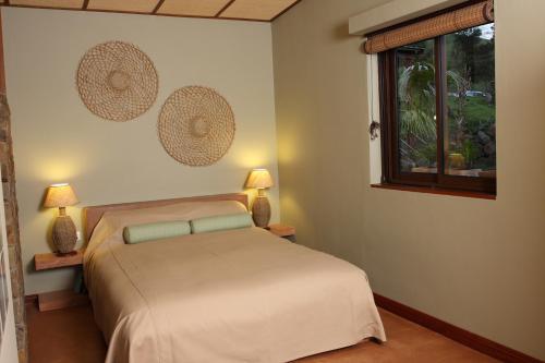 Postel nebo postele na pokoji v ubytování La Hacienda Mauritius