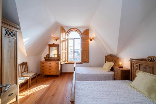 Ένα ή περισσότερα κρεβάτια σε δωμάτιο στο Casa Amarela, 9-room beach house