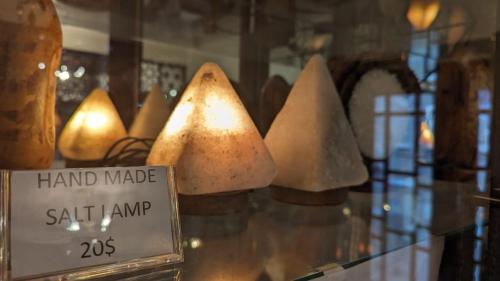 a display case with a bunch of hand made artifacts at Eileen Hotel Cairo in Cairo