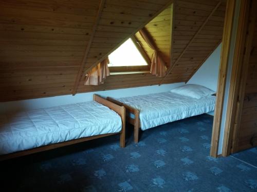 Postel nebo postele na pokoji v ubytování Apartma Brin Bovec