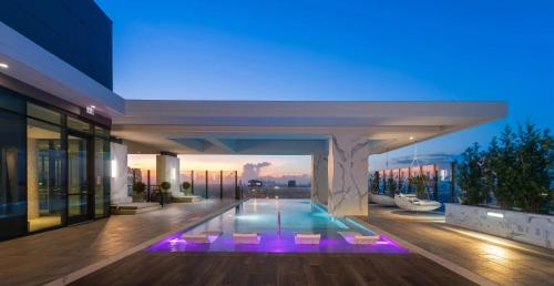 a view of a house with a pool at night at Hanover BLVD Place in Houston