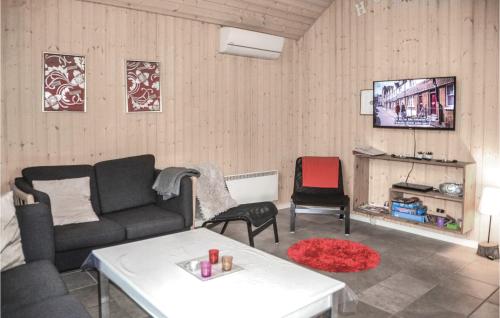 TV a/nebo společenská místnost v ubytování Hugoline