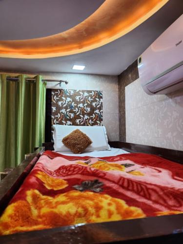 Ένα ή περισσότερα κρεβάτια σε δωμάτιο στο Dk's Paradise Homestay