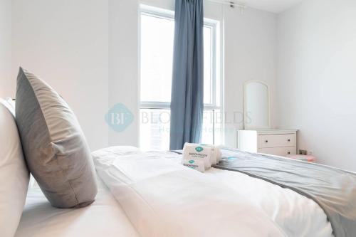 Postel nebo postele na pokoji v ubytování Grandeur 2 Bedroom Suite