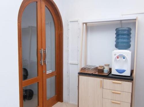 Kuchyň nebo kuchyňský kout v ubytování Kareem Syariah Hostel Bukittinggi