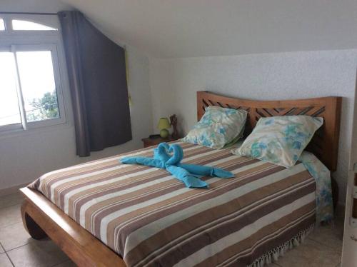 Postel nebo postele na pokoji v ubytování A la belle Etoile. Appt de charme 1er ét. villa