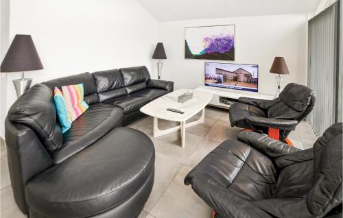 TV a/nebo společenská místnost v ubytování Holiday Home Rønnemose Sydals Xii