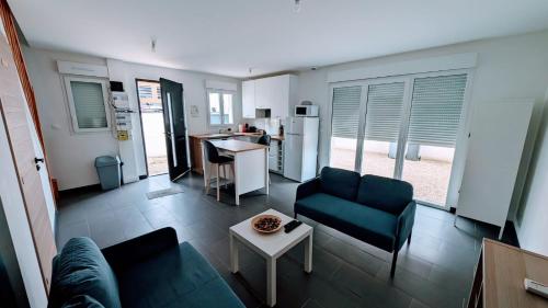 Η κουζίνα ή μικρή κουζίνα στο Charmante Maison 2 chambres à Dammarie Les Lys