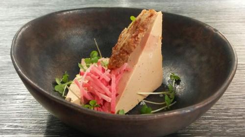 a sandwich in a bowl on a table at Hotel ABBEY in Grimbergen