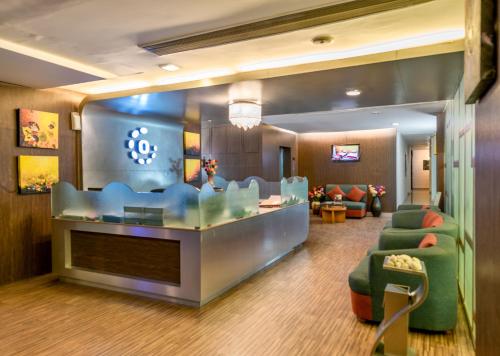 a lobby of a hotel with a waiting room at Octave Hotel & Spa - Marathahalli in Bengaluru