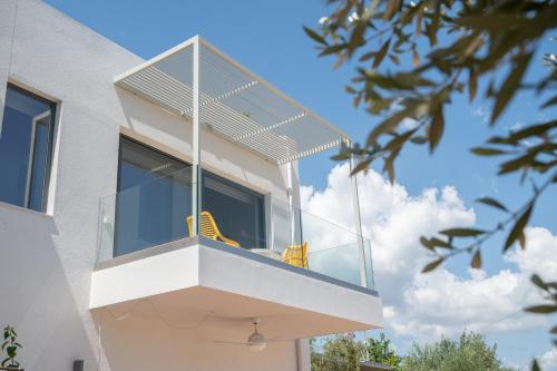 Un balcón o terraza de VUAR SUITES