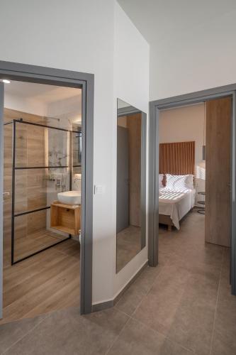Cama o camas de una habitación en VUAR SUITES