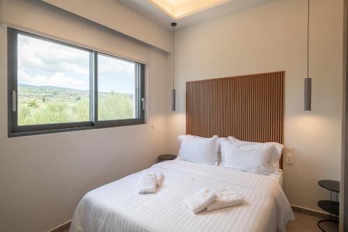 Cama o camas de una habitación en VUAR SUITES